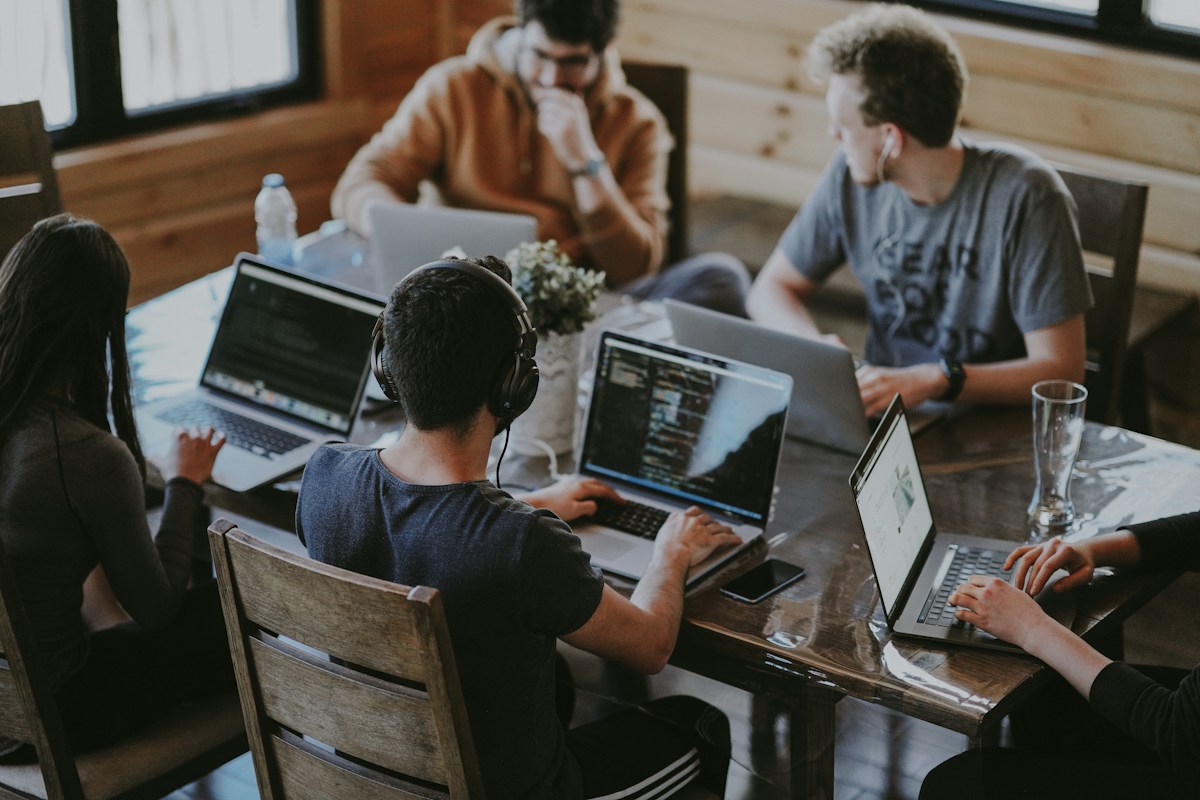 Professionals collaborating around a table